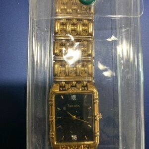 Bulova Gold Watch with Black Face